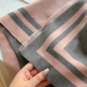 Thick pink and grey striped cashmere feel scarf with tassel fringe for winter warmth