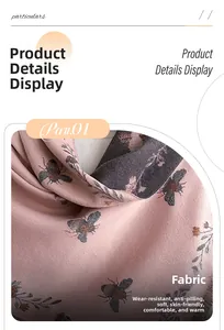 Detail showing jacquard floral bee pattern and soft anti-pilling cashmere-like fabric