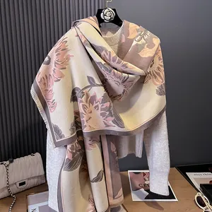 Detailed view of sunflower jacquard scarf with fine fringe on white knit sweater