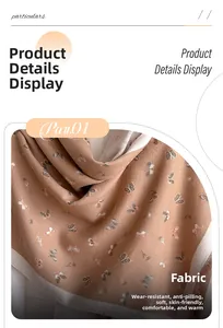 Detail view of butterfly print scarf showing anti-pilling and soft knit texture