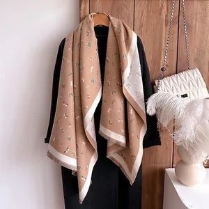 Elegant butterfly print double-sided cashmere-like shawl with fringes in warm camel tone