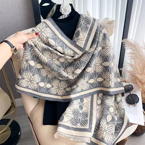 Thick winter pashmina shawl for women with geometric patterns and fringe detail