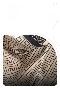 Detail of soft geometric patterned pashmina scarf with anti-pilling and warm fabric texture