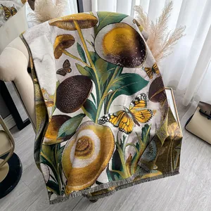 Detail of vintage mushroom and butterfly jacquard weave with gray tassel fringe