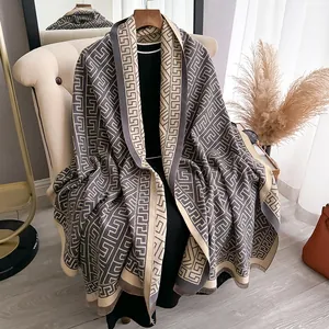 Classic beige and coffee geometric patterned double-sided shawl with soft fringe detail