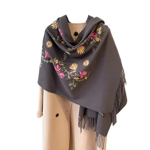Thick faux cashmere floral embroidery scarf with tassels on beige winter coat