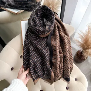 Classic black and brown geometric maze pattern cashmere scarf with fine tassel edges