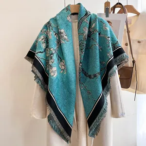 Detail of artistic Van Gogh almond blossom print shawl with fringes and soft texture