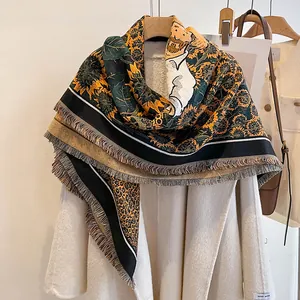 Detailed view of Van Gogh style artistic print on warm pashmina shawl with tassels