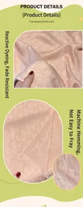 Detail of pink silk-like scarf with D-letter print, reactive dye and machine-rolled edges