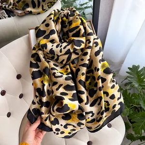 Elegant leopard print silk scarf for women featuring a smooth satin finish and soft drape