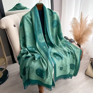 Green silk cotton scarf with cute cartoon cat prints and fine fringe details