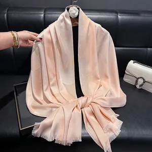 Elegant champagne pink silk shawl with subtle shimmer and delicate fringe details