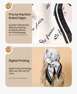 Detail view of imitation silk scarf featuring digital letter print and precise machine rolled hem