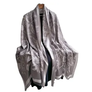 Grey-purple floral tencel cotton scarf with white jacquard and tassels on a hanger