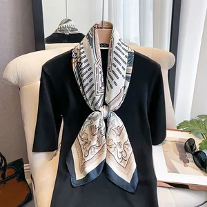Elegant rectangular silk scarf with vintage geometric patterns on cream base fabric