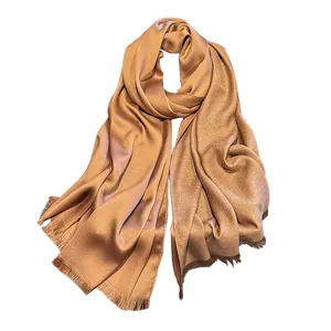 Elegant gold shimmering silk blend scarf with fringe edges for women beach wrap