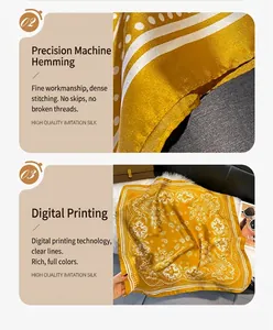 Detail van gele zijde-achtige sjaal met Paisley-print en fijne machinale rolzoom