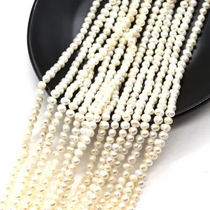 White natural freshwater pearls strands in near-round shape for DIY jewelry making