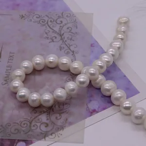 Macro view of high-quality white freshwater pearls with natural luster for DIY jewelry