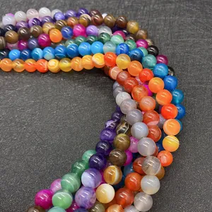 Macro shot of colorful striped agate beads with natural textures for DIY jewelry making