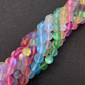 Close-up of matte synthetic moonstone round beads in rainbow colors for DIY jewelry