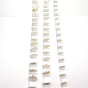 Natural white freshwater shell beads in hand-shaped Hamsa design for jewelry making