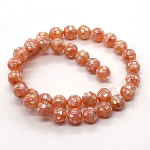 Natuurlijke oranje schelpkralen met wit mozaïek inlegwerk voor doe-het-zelf sieraden