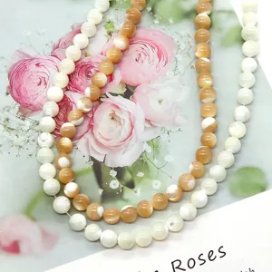 Natural sea shell round beads in white and caramel colors for DIY jewelry making