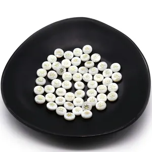 Natural shell beads with golden sun pattern for DIY jewelry making on black tray