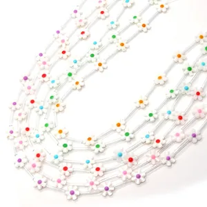 Flower shell beads with colorful centers for DIY jewelry making and craft projects