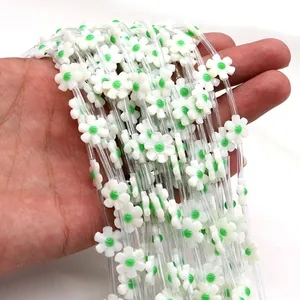 Handheld 12mm white shell flower beads with green center for DIY jewelry making