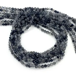 Perle rotonde sfaccettate in quarzo rutilato nero naturale per creazione gioielli