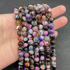 Primer plano de cuentas redondas de ágata de fuego de 8-10mm para joyería artesanal