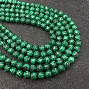 Macro di perle di malachite naturale con motivi a bande verdi e nere per gioielli fai-da-te