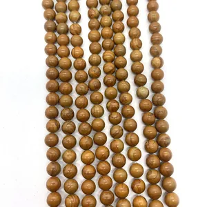 Perline tonde in pietra a grana di legno naturale per collane e bracciali fai da te