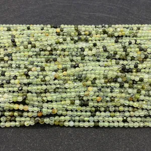 Macro detail of faceted green prehnite stone beads for handmade DIY jewelry making