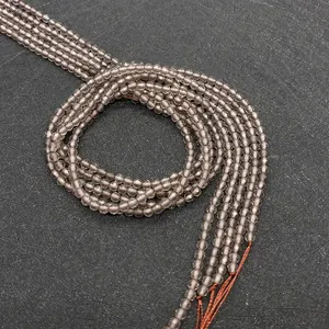 Macro view of smoky quartz faceted beads 2mm to 4mm for DIY jewelry making