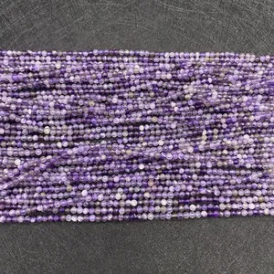 Macro detail of faceted purple amethyst beads strings for DIY jewelry making