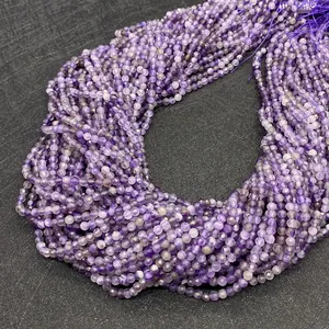 Detailed view of faceted natural amethyst purple beads for DIY jewelry making