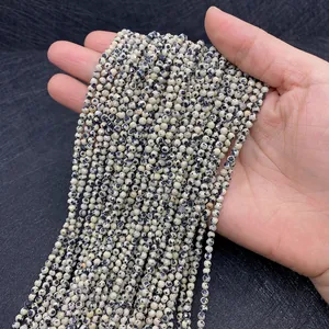 Macro view of faceted natural dalmatian stone beads for DIY jewelry making accessories