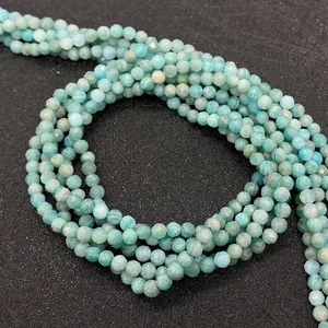 Macro shot of faceted light blue amazonite gemstone beads for DIY jewelry making