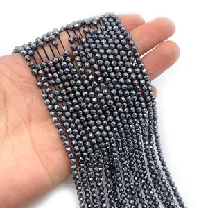 Perline tonde in ematite naturale sfaccettata per creazione gioielli sulla mano