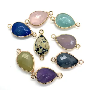Faceted teardrop gemstone connectors in various colors with gold-plated metal frames