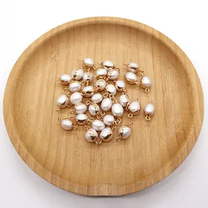 Close-up of irregular freshwater pearl pendants with gold plating for jewelry DIY