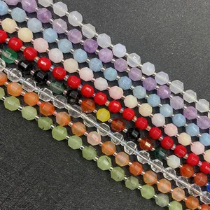 Close-up of faceted natural gemstone beads in multiple colors for DIY jewelry making