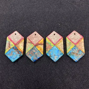 Flat lay of four hexagonal multi-color natural stone pendants for DIY jewelry making