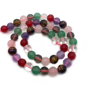 Macro shot of colorful mixed natural stone beads including tiger eye and agate for jewelry DIY