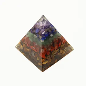 Orgone energy pyramid with layered natural tiger eye and amethyst healing stones
