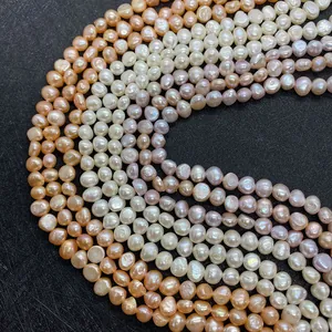Natural freshwater baroque pearl strands in white, pink, and orange for DIY jewelry making